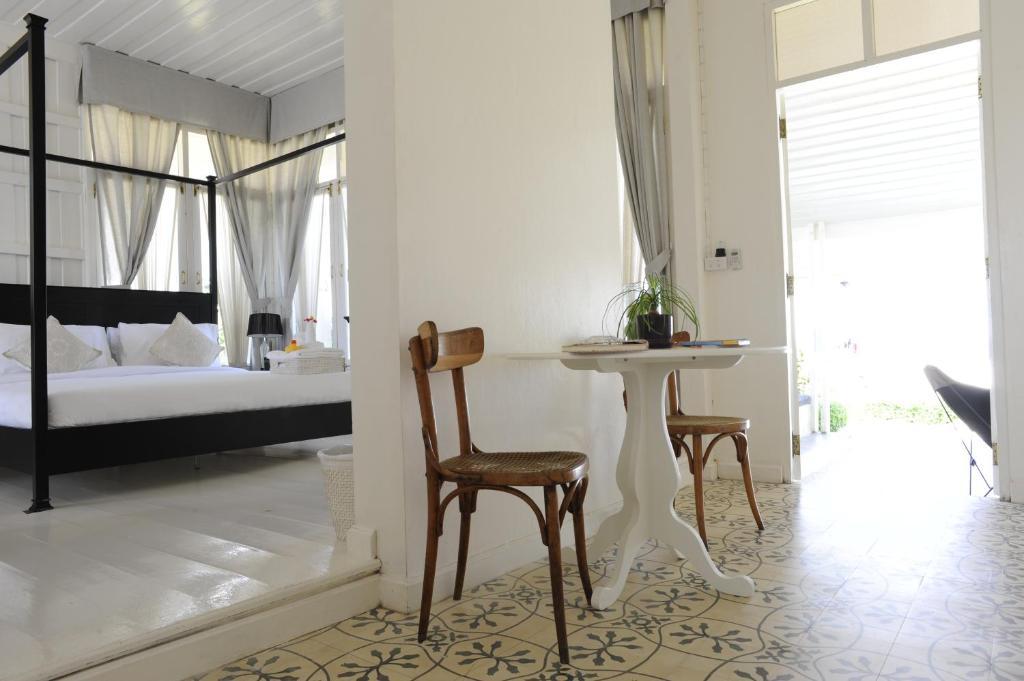 The Hen Hua Hin Hotel Quarto foto